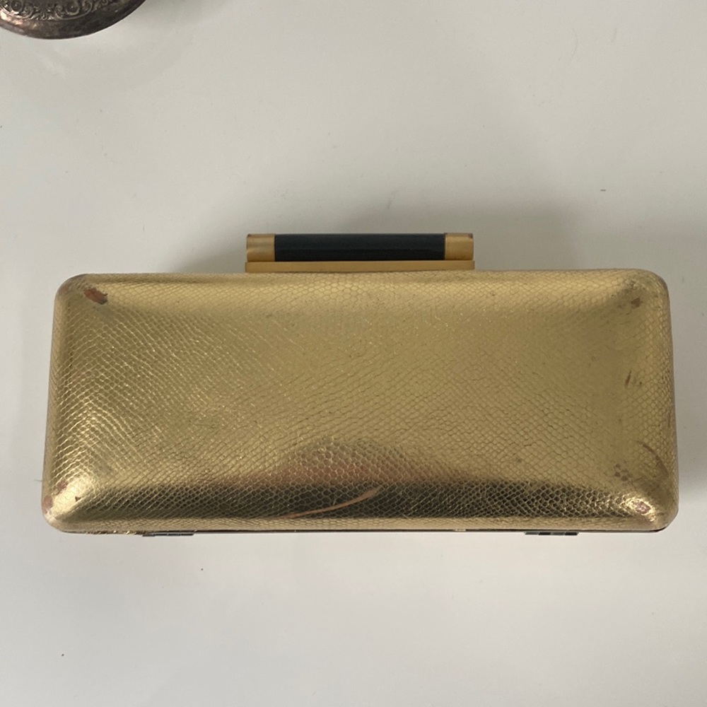 diane von furstenberg gold clutch